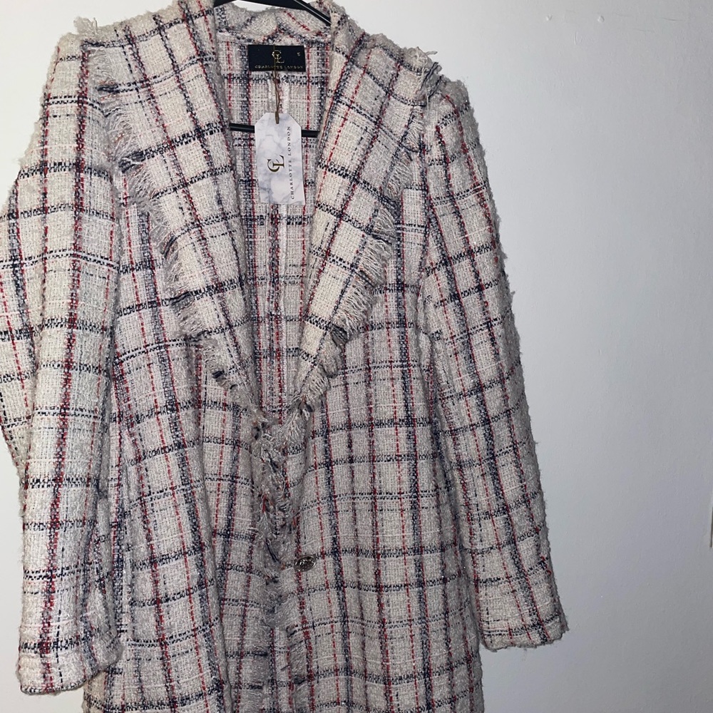 Red, navy, and cream coat